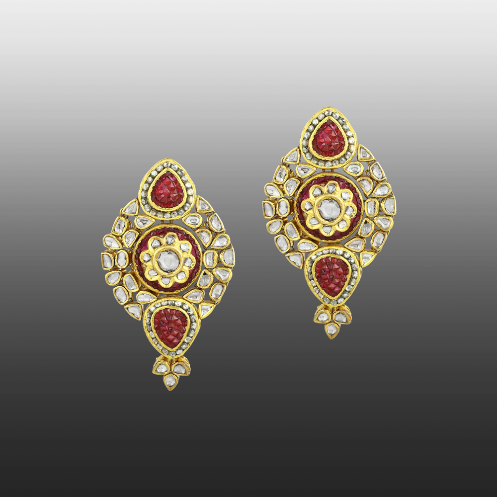 Central Floral Polki Earrings with Red Gemstones